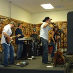 Clear photo of the band at work
