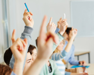 bigstock-Many-students-raising-their-ha-44817961